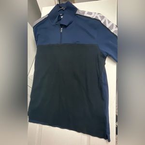 Polo Shirt by “DKNY” (Size L
